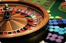 Comp Points – roulette wheel and chips